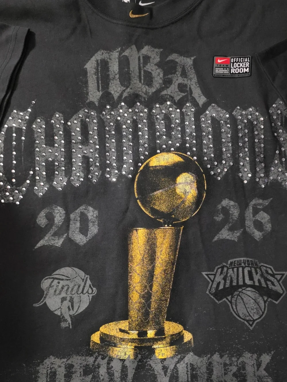 Brand New Knicks Champipnship Nike Black Tee with Gold Trophy Accent Size XXL.